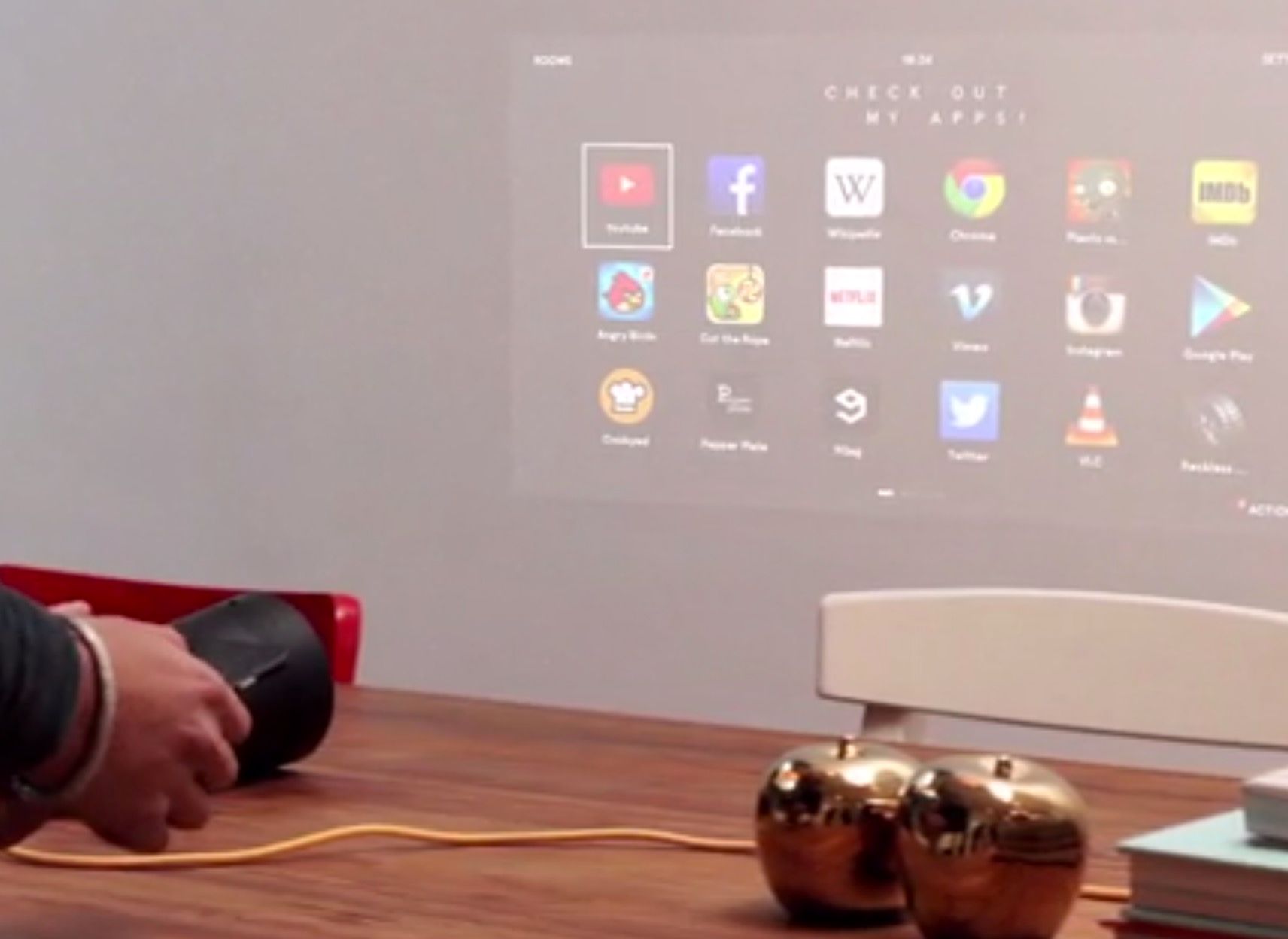 beam is the light bulb that doubles as a projector turns a table into a screen image 2