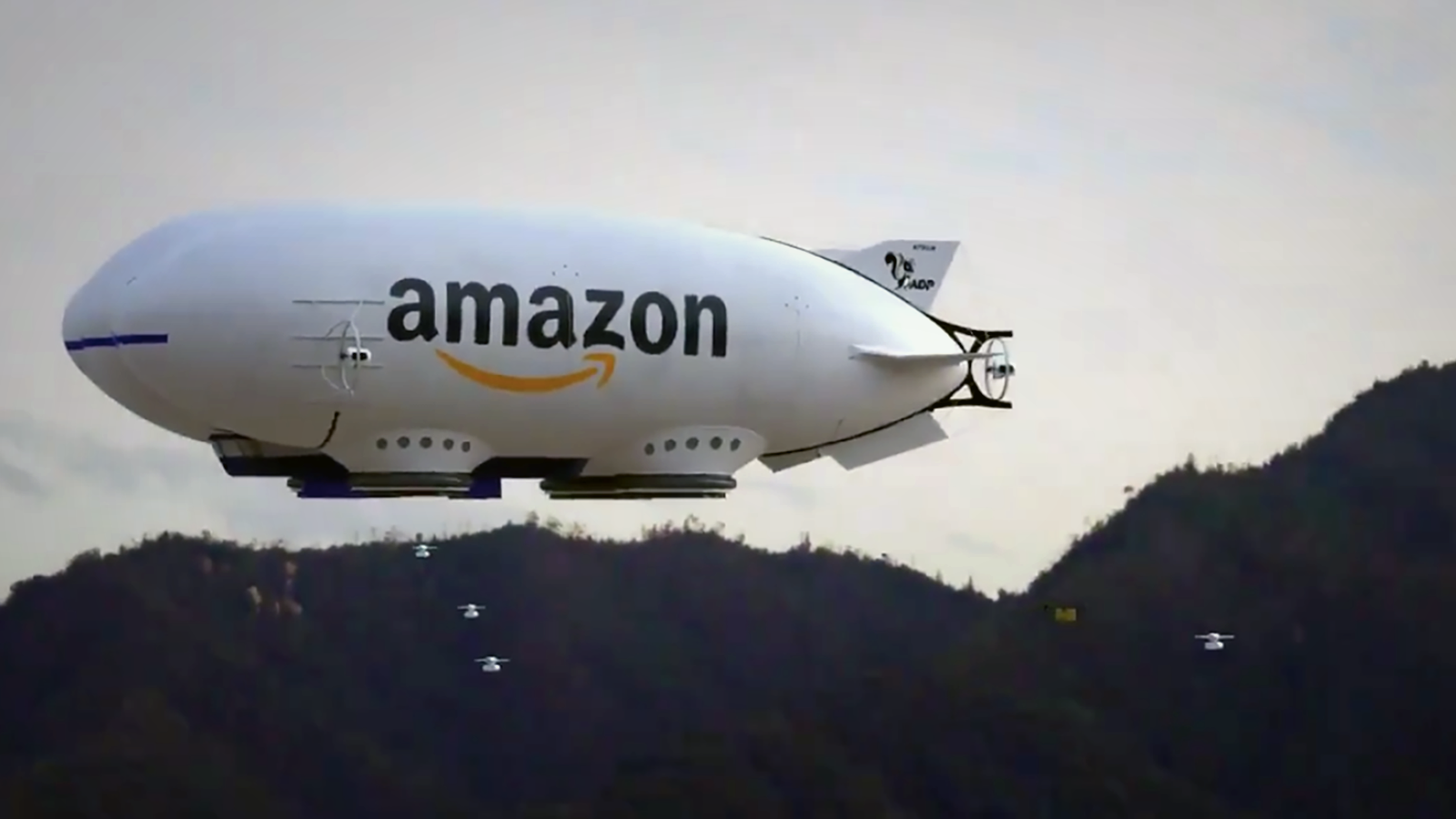 Watch drones fly out of a giant Amazon hover blimp