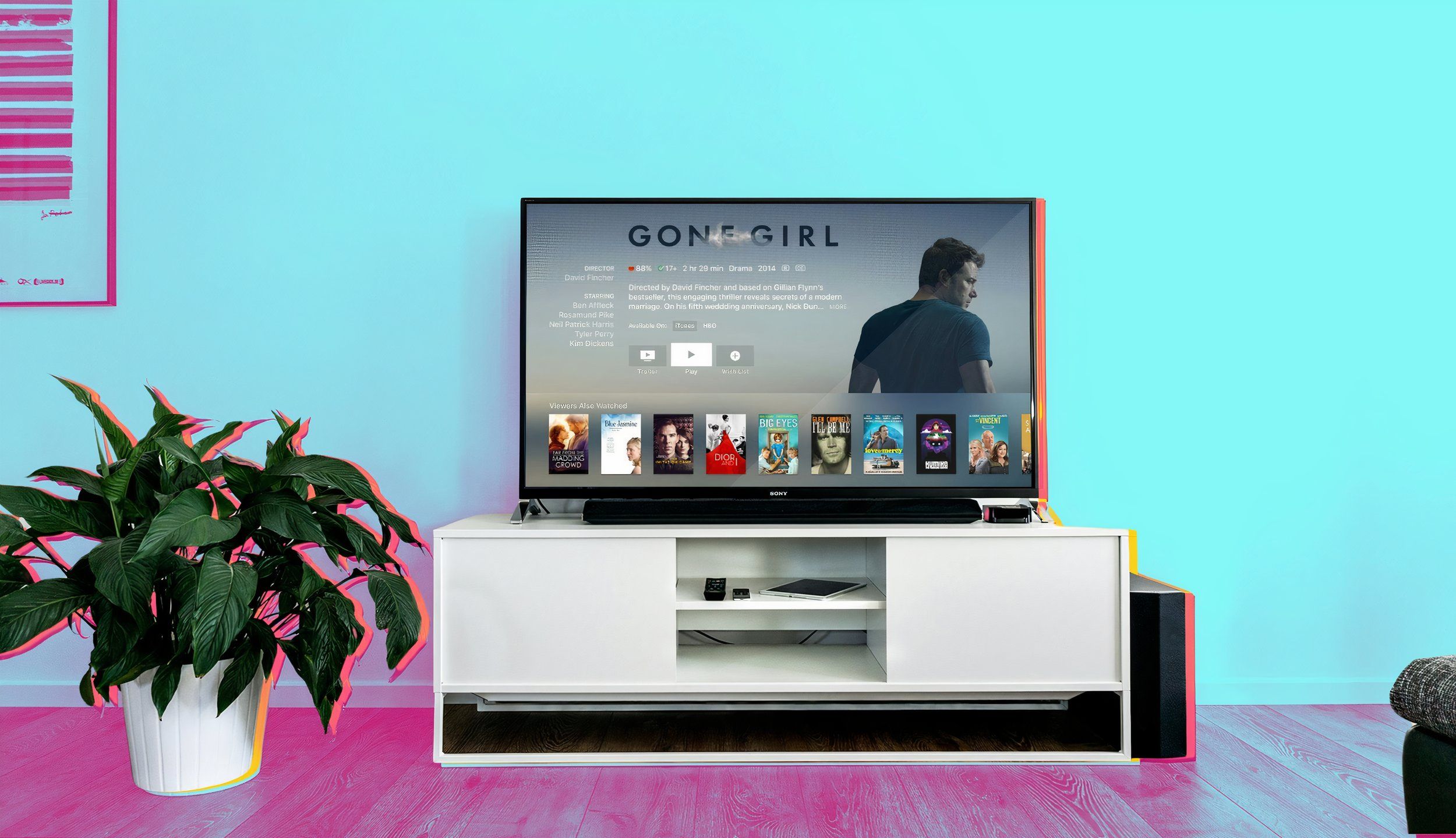 A duotone photo of a Smart TV sitting on media console in a living room.