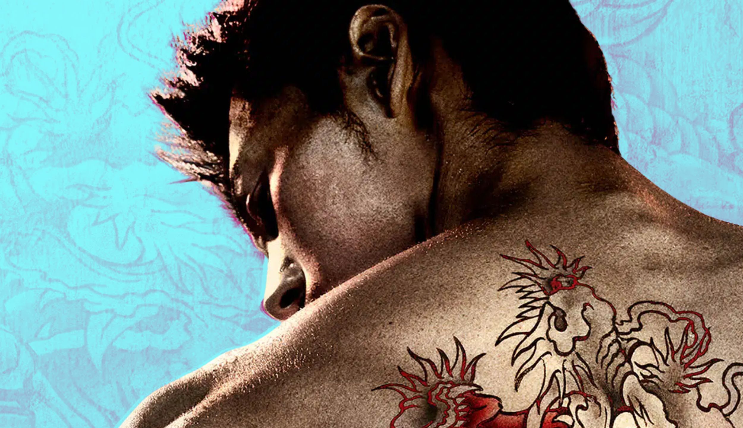 Kiryu showing his back tattoo.