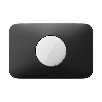 A round black card holder with an AirTag in it.