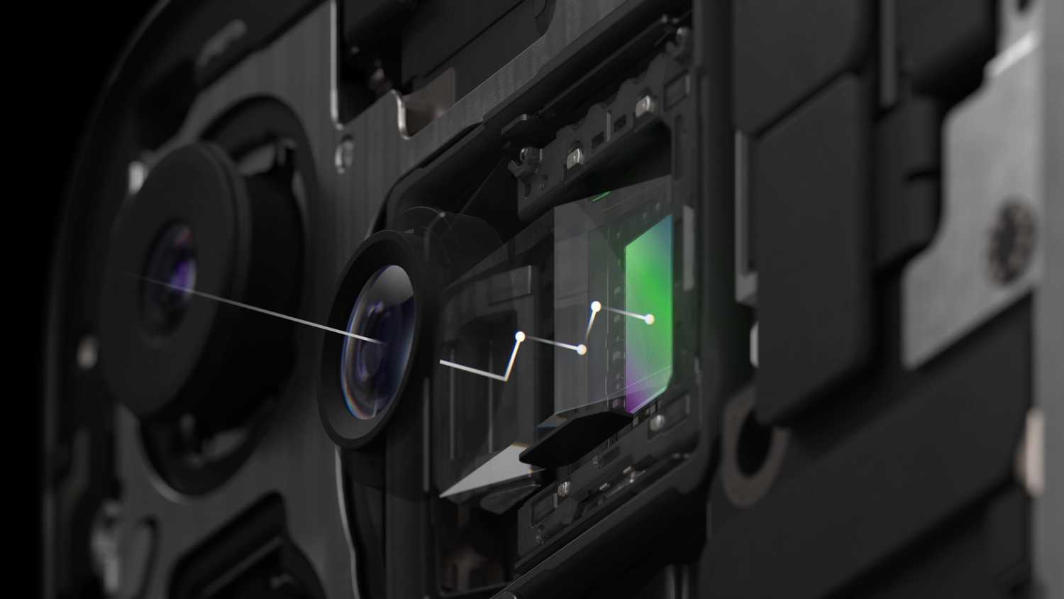 An iPhone 15 Pro's tetraprism lens and camera sensor.