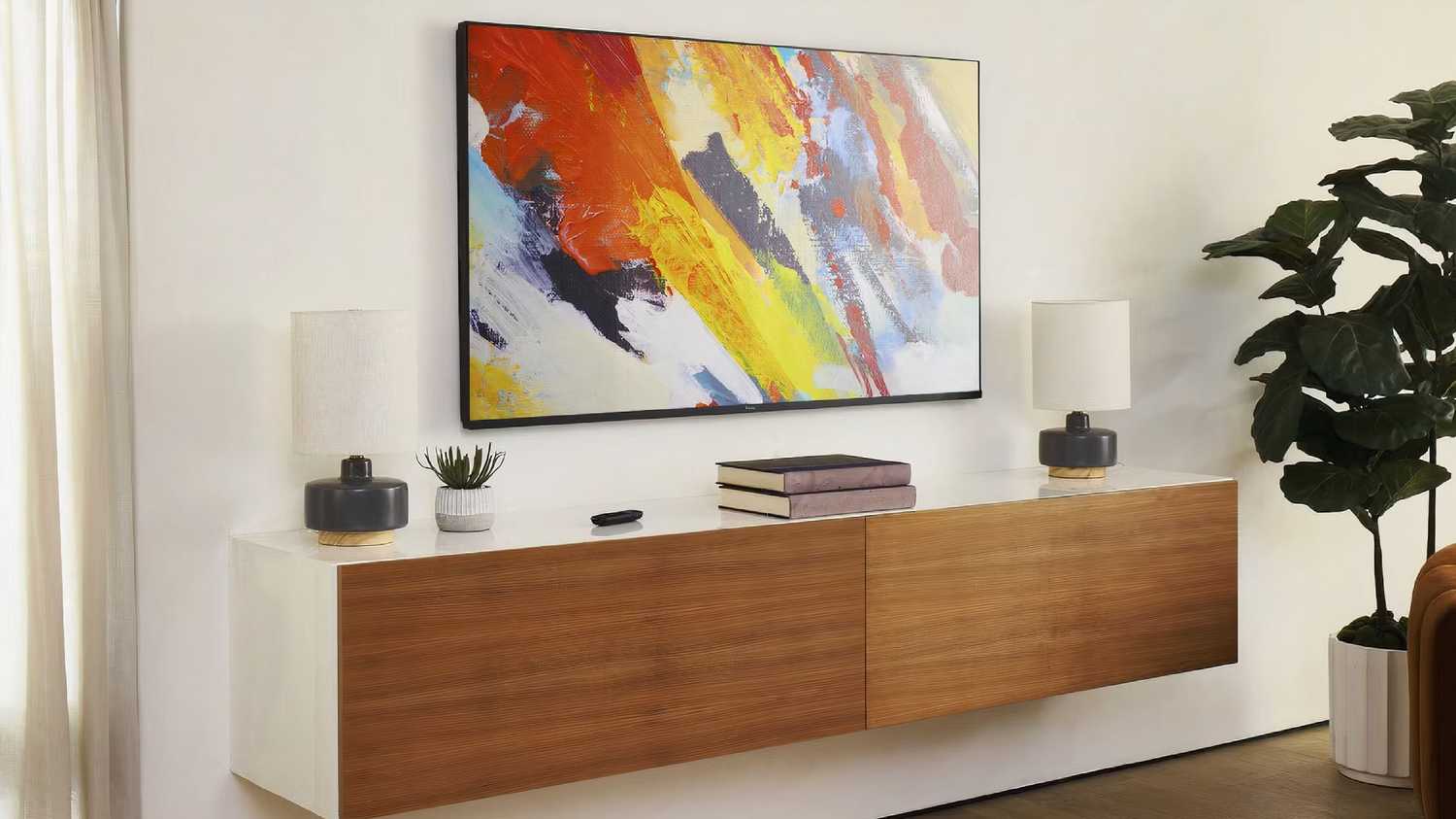 Roku backdrops on a TV above a piece of furniture