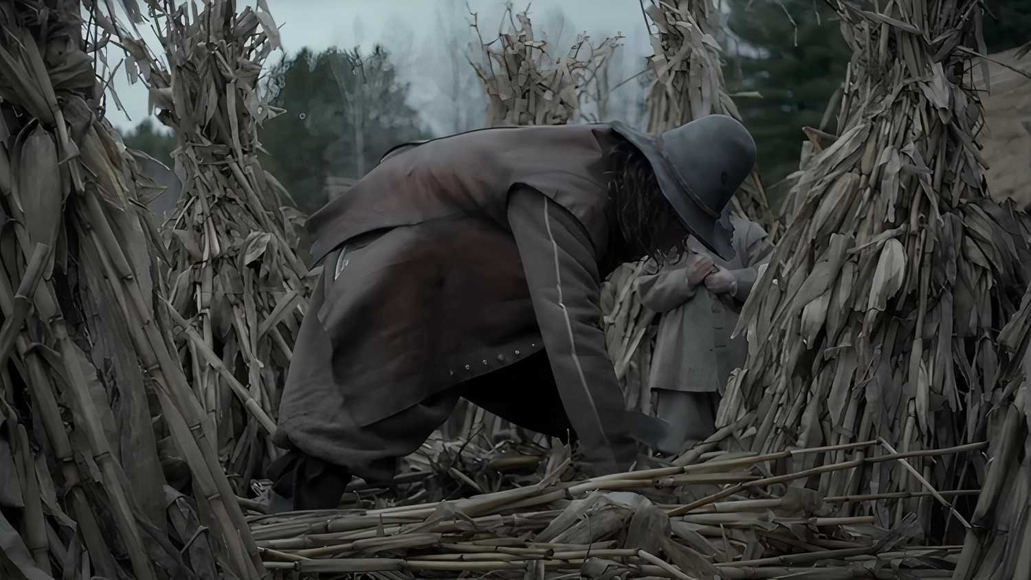 William harvesting crops in The Witch.