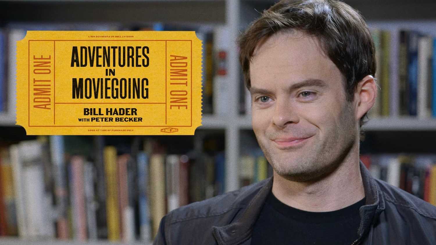 Criterion adventures in moviegoing hader with a man smiling in front of a bookcase. 