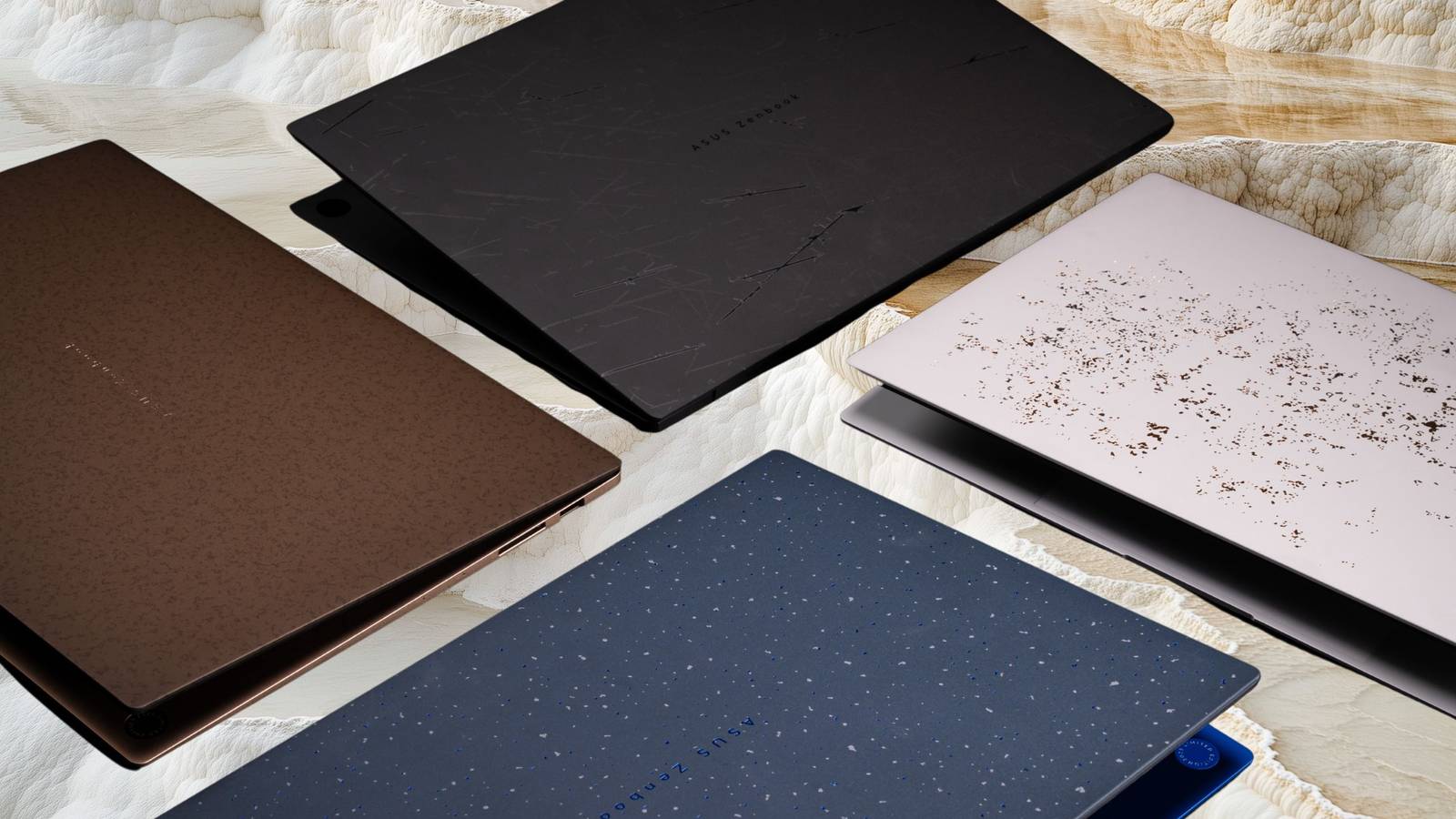 Four new Zenbooks in front of a mineral pool. 