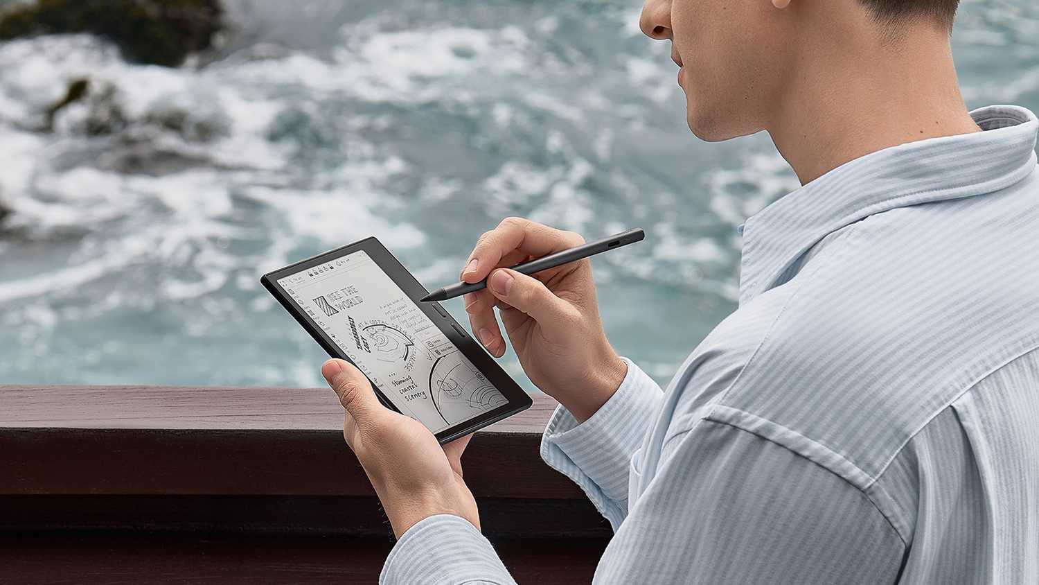 Person writing on Boox Go 7 tablet.
