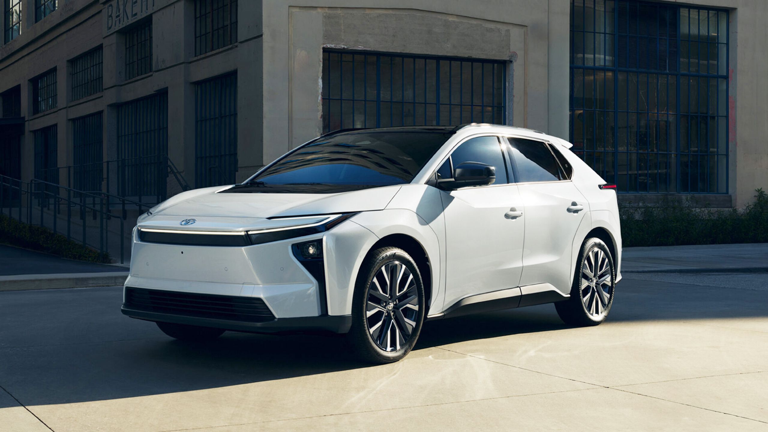 A parked 2026 Toyota bZ in white.