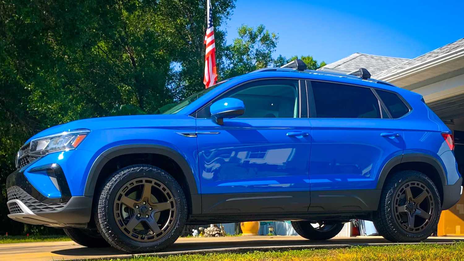 A 2022 Volkswagen Taos with a B2B Fab lift kit installed. 