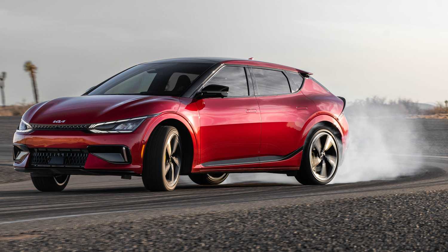 Red Kia EV6 SUV showing it power.