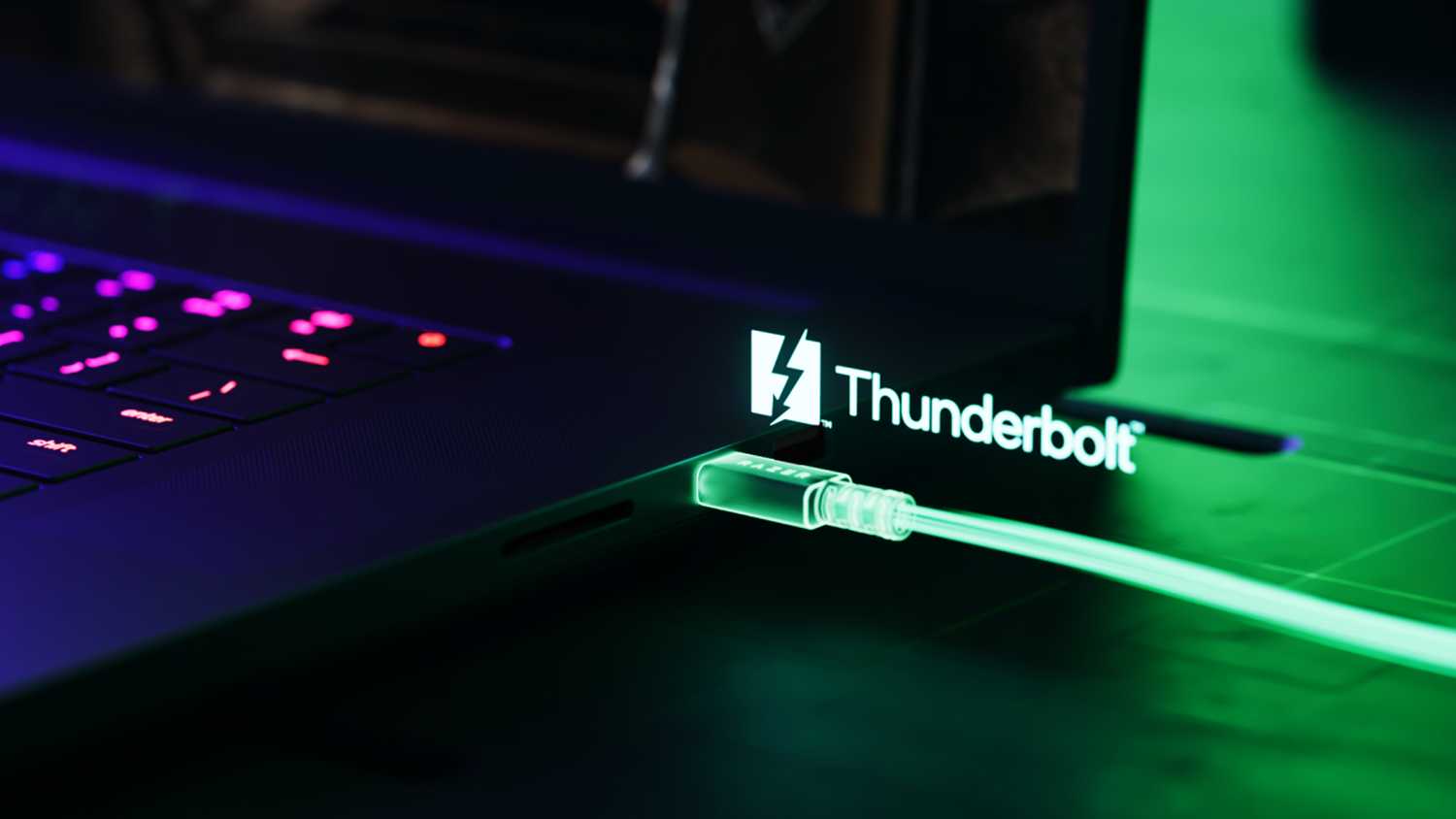 A Razer laptop with a Thunderbolt 5 cable attached.
