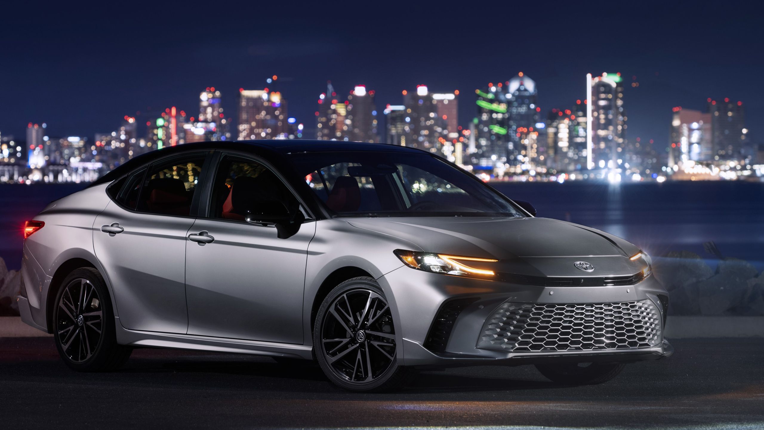 Toyota Camry parked at night