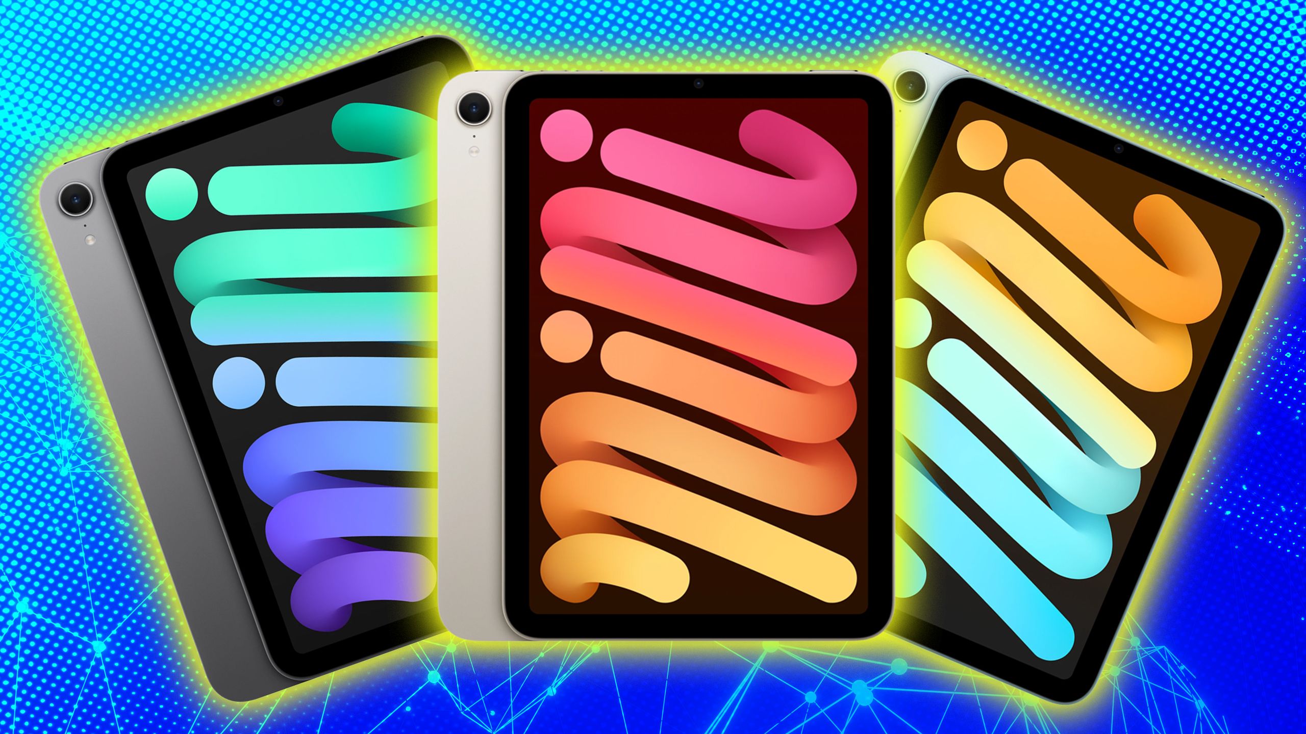 Three ipads glowing yellow. 