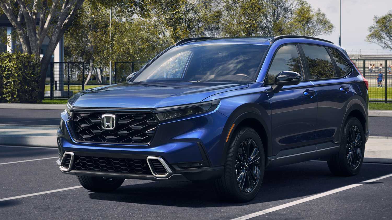 Honda CR-V Sport Touring Hybrid in a parking lot. 