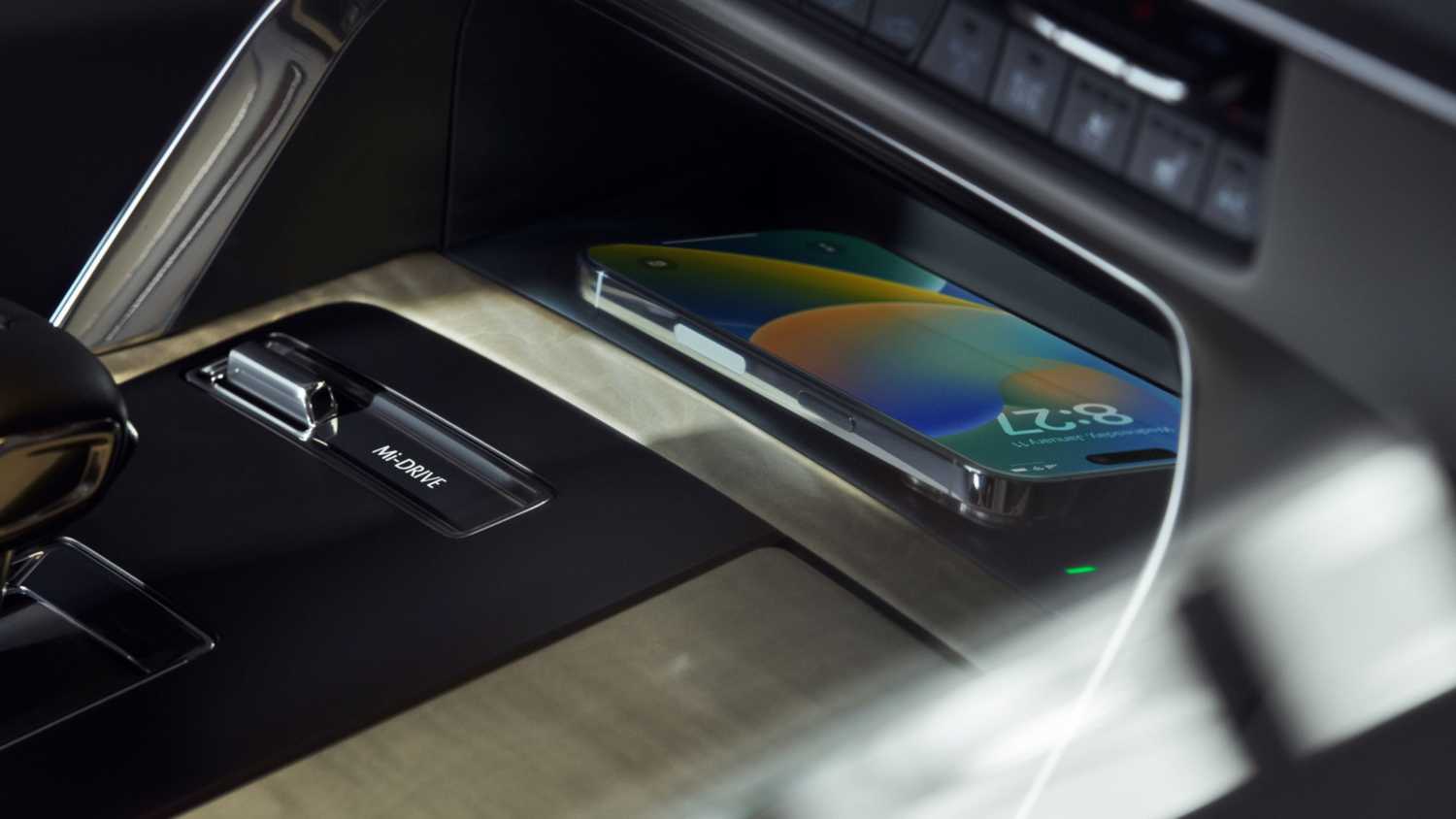 Charging an iPhone in a center console. 