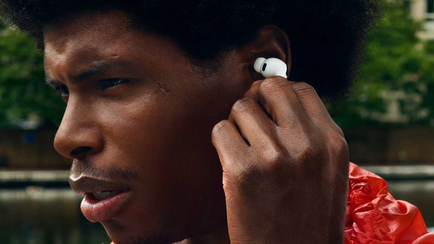 Person working out with AirPods Pro 3