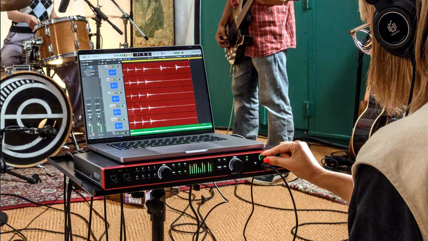 Using a larger audio interface for a recording a band session on a laptop.