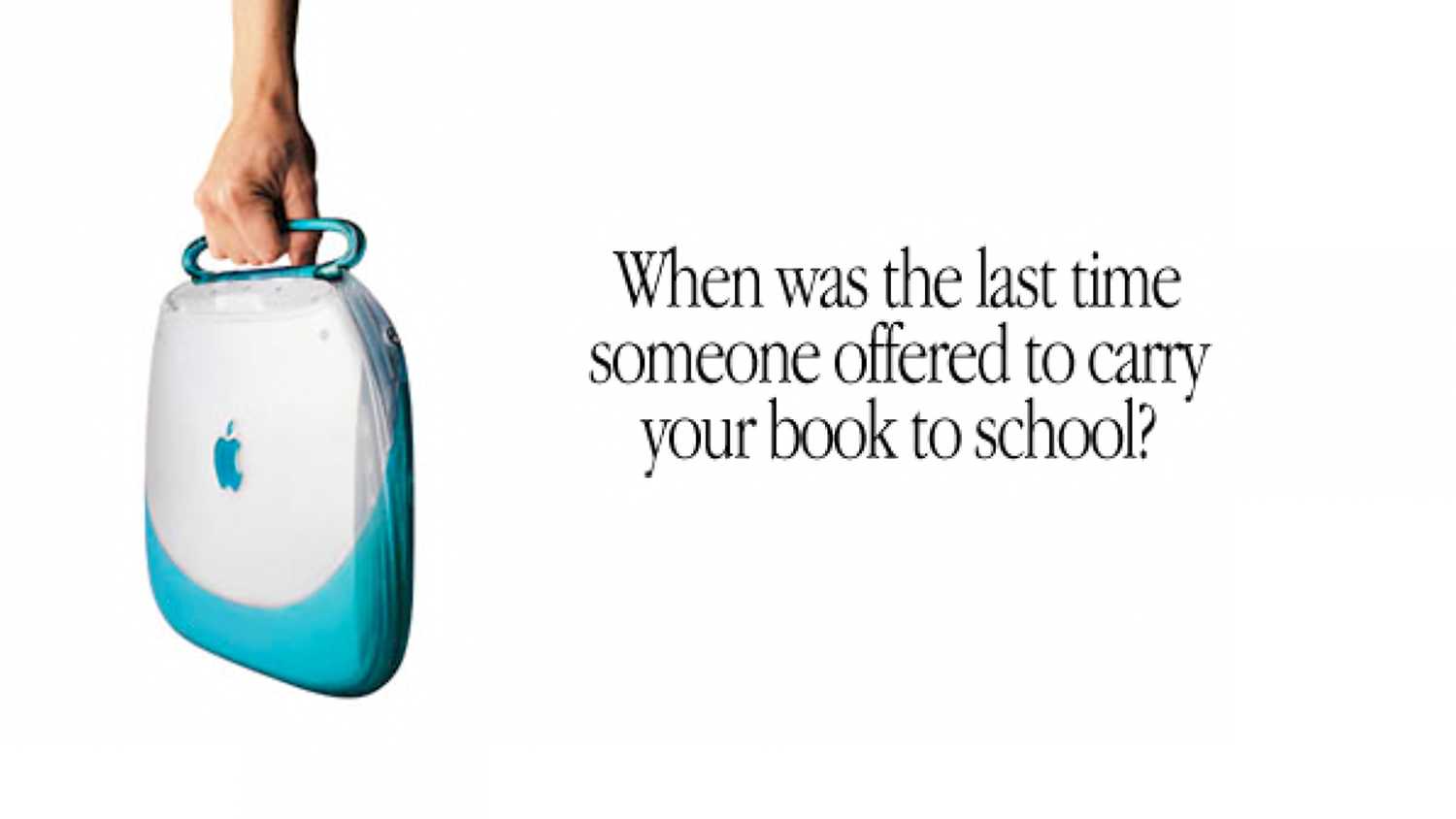 Apple 광고에서 파란색 iBook을 들고 있는 손.