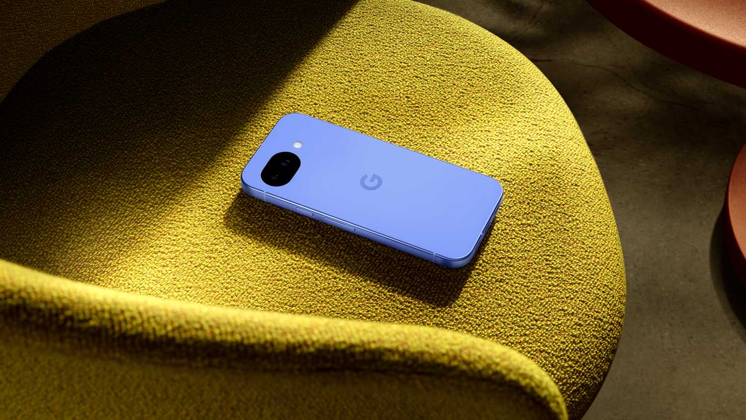 Google Pixel 10a on a chair.
