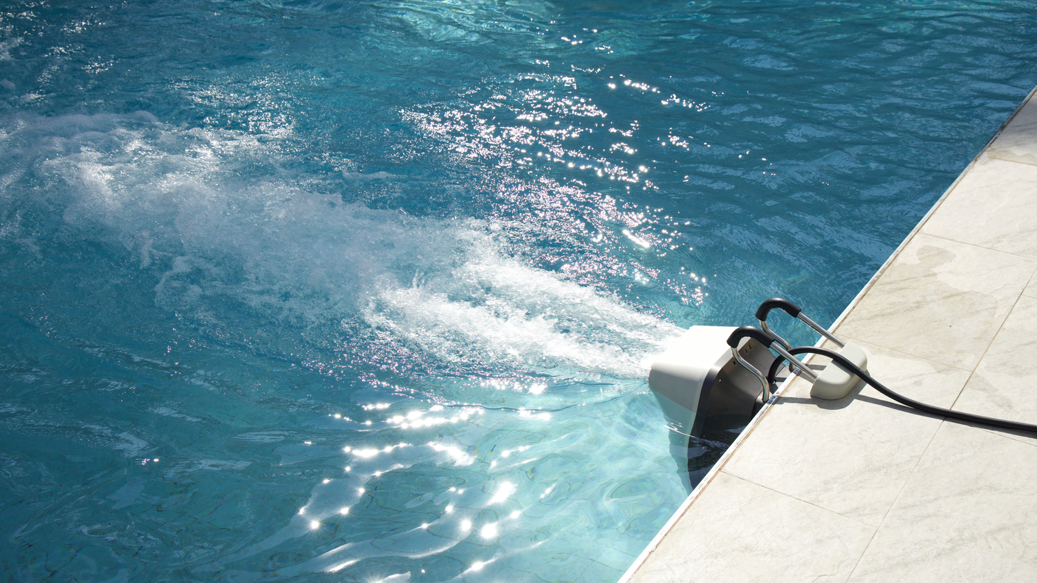 iGarden Swim Jet X Series angled rear view, producing current in the sunlight