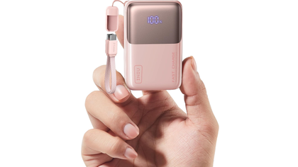 INIU Pocket Rocket P50 in hand on a white background