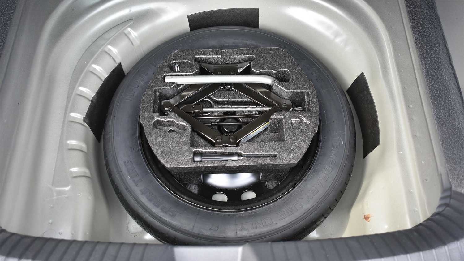 A still photo of a Volkswagen Atlas spare tire. 