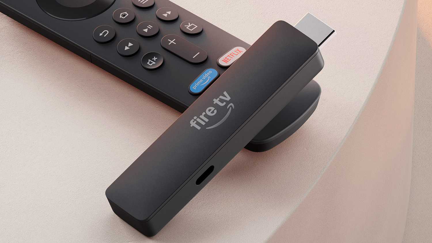 New Fire TV Stick HD next to remote.