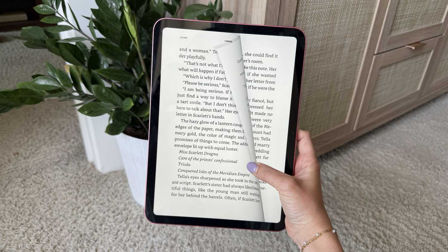 Turning a page on an iPad. 