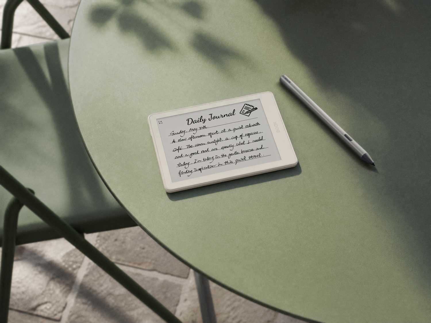 A Boox Go 6 (Gen II) sitting on a table next to an InkSense Plus stylus.