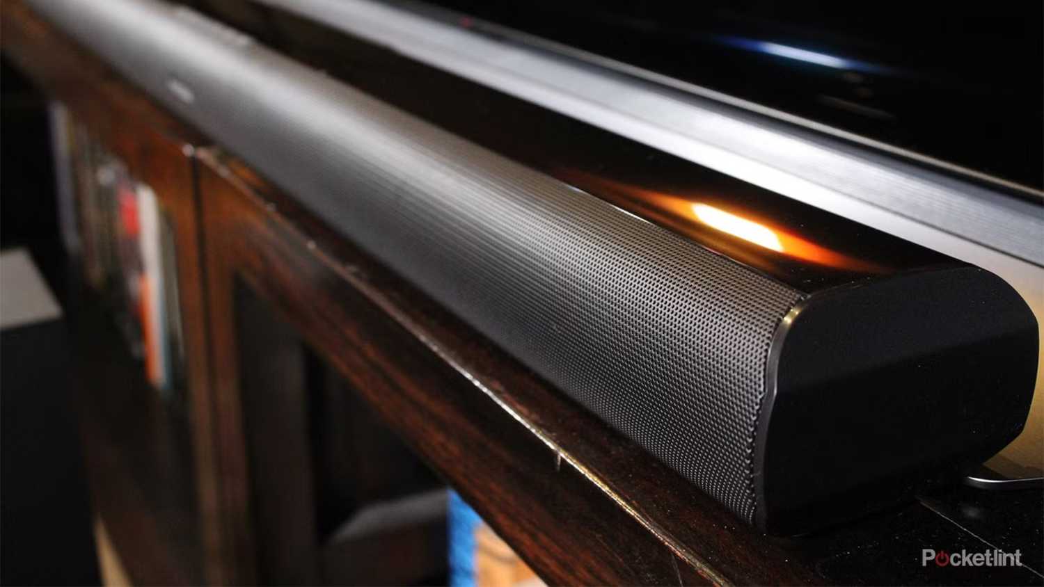 A soundbar under a TV.