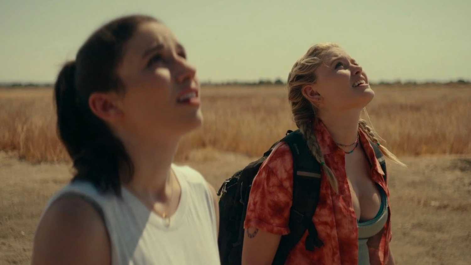 Grace Caroline Currey and Virginia Gardner looking up in Fall