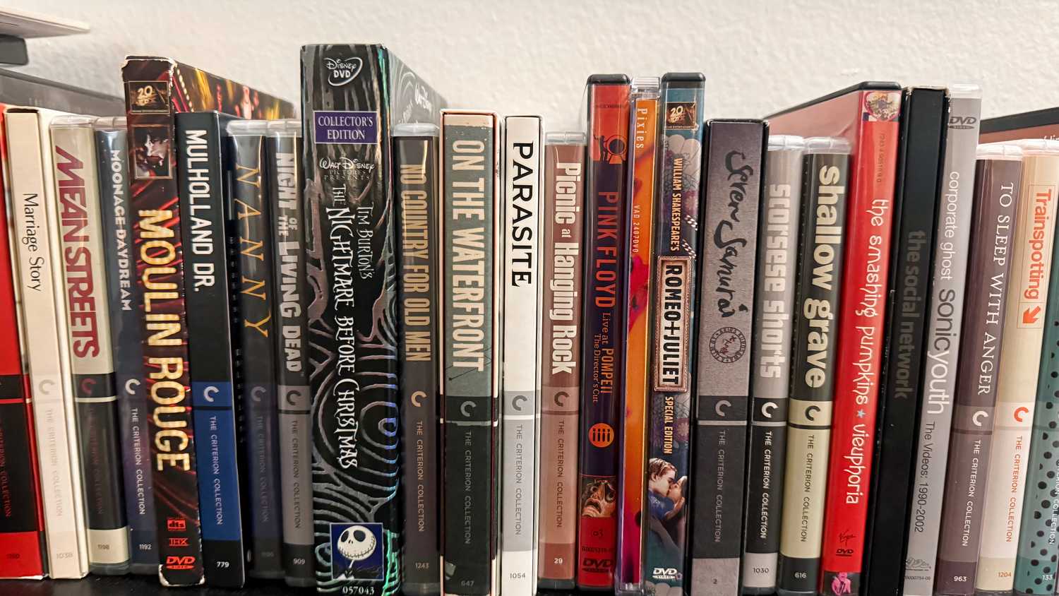 Row of Blu-rays and DVDs on display.
