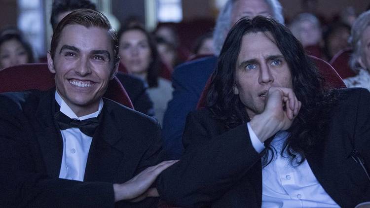 The Disaster Artist still James Franco in a movie theatre