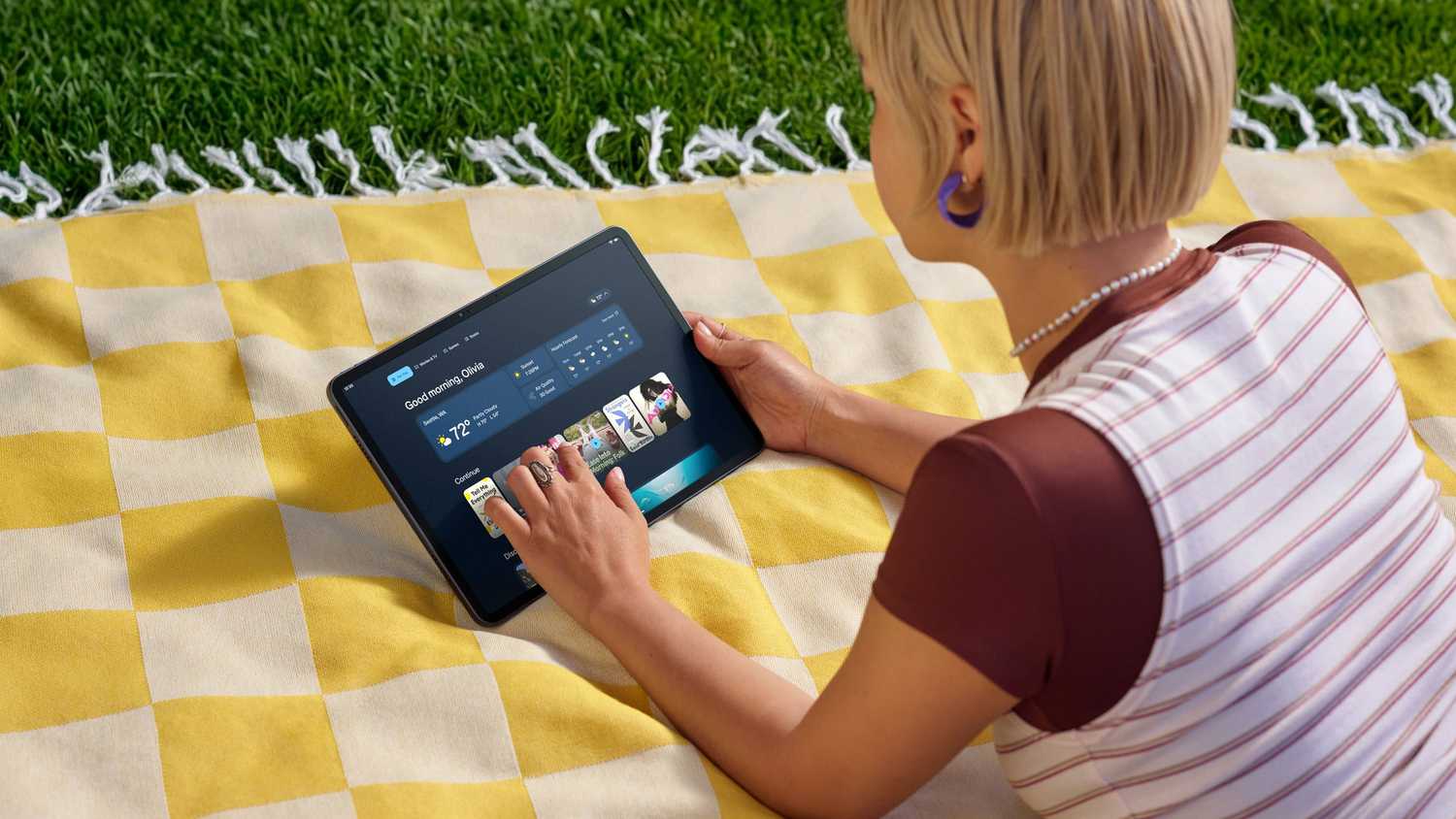 Person using Amazon Alexa Tablet 12 Pro.