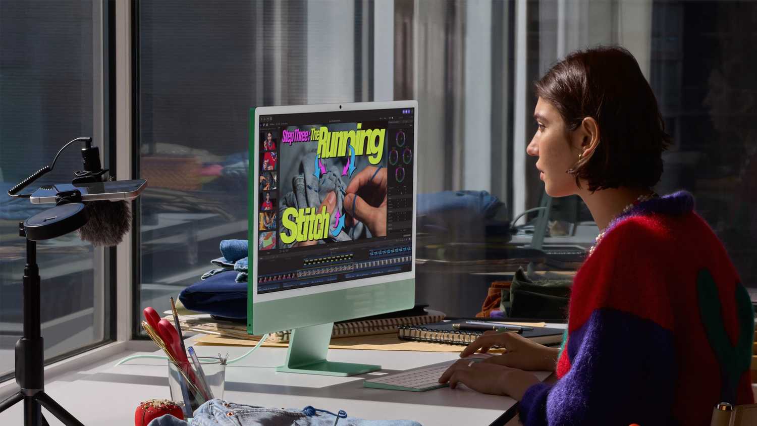 Person using M6 iMac.