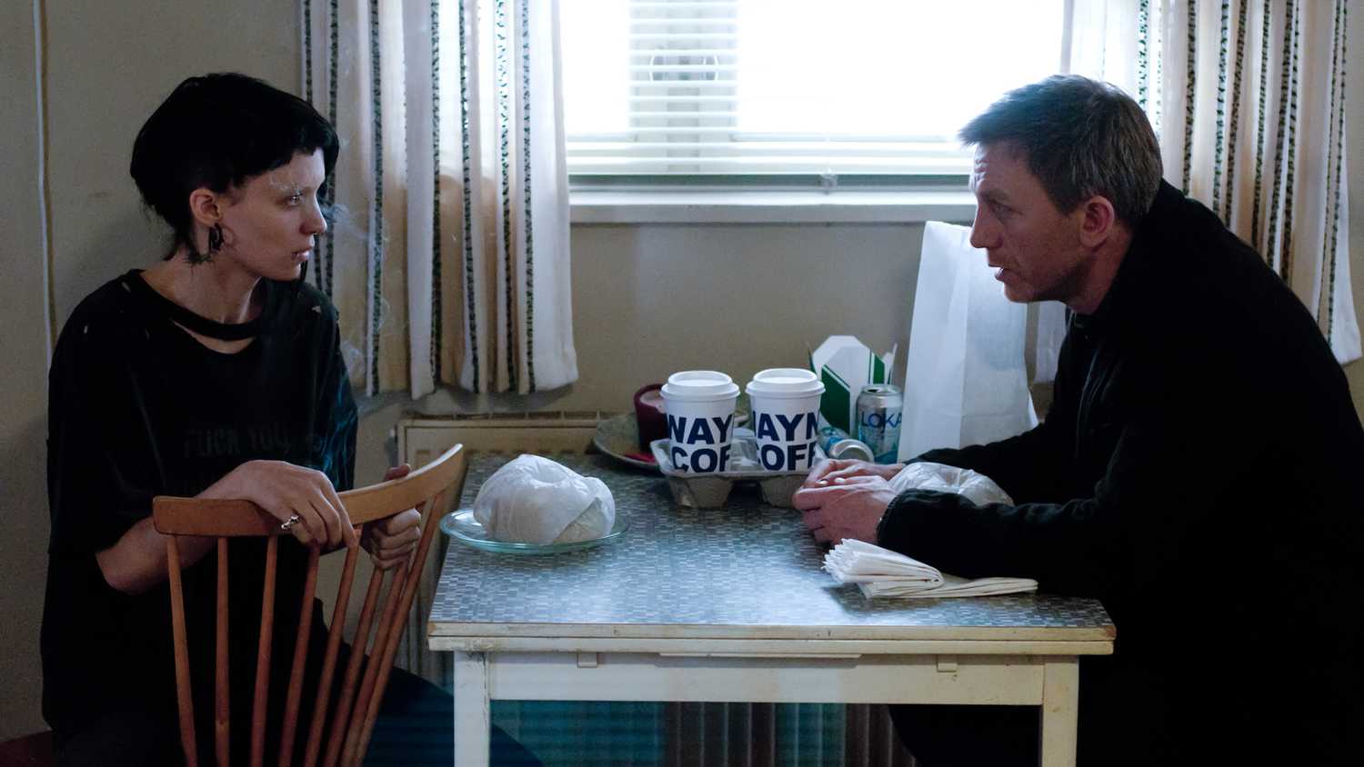 Screenshot from The Girl with the Dragon Tattoo starring Rooney Mara and Daniel Craig.