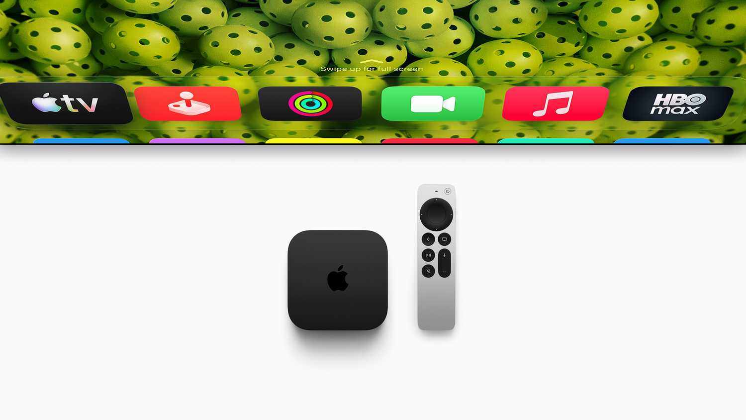 New Apple TV 4K next to TV screen.
