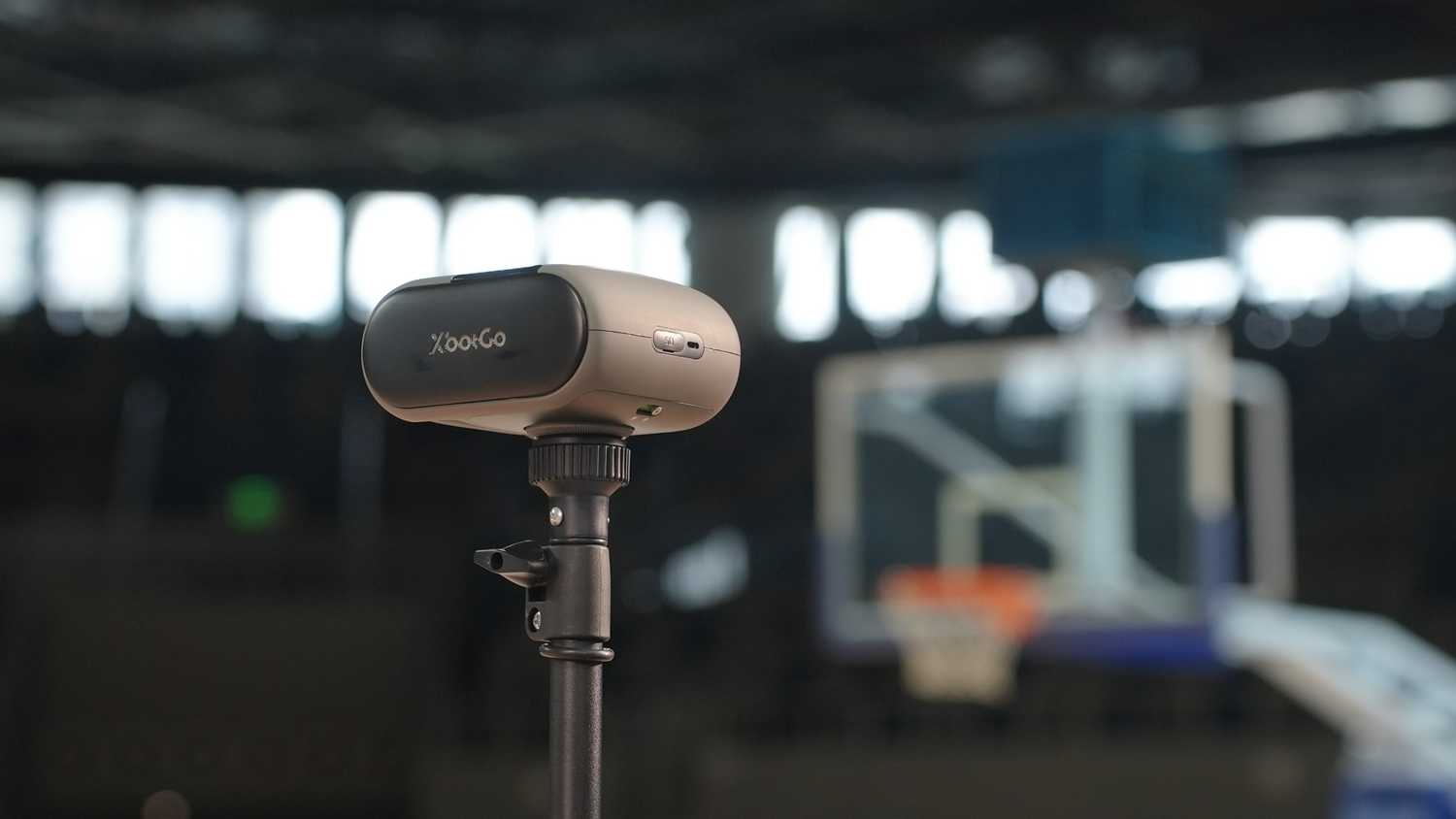 XbotGo Falcon filming on a basketball court.