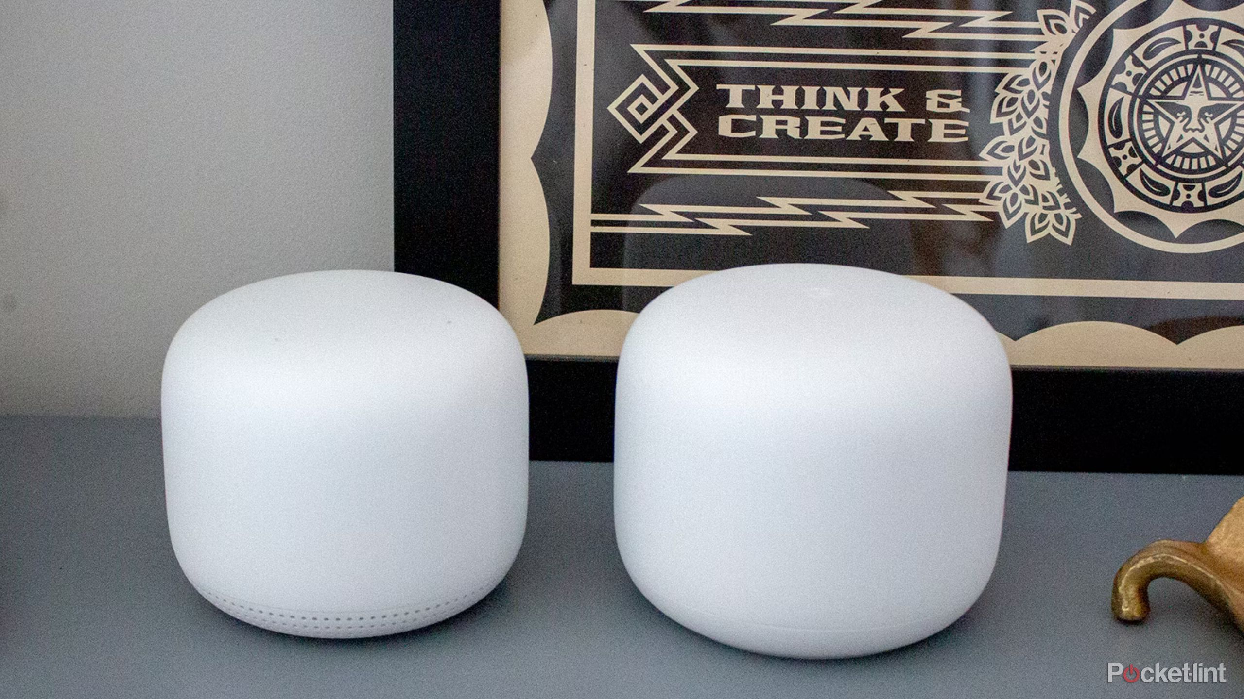A pair of Google Nest Wifi units.