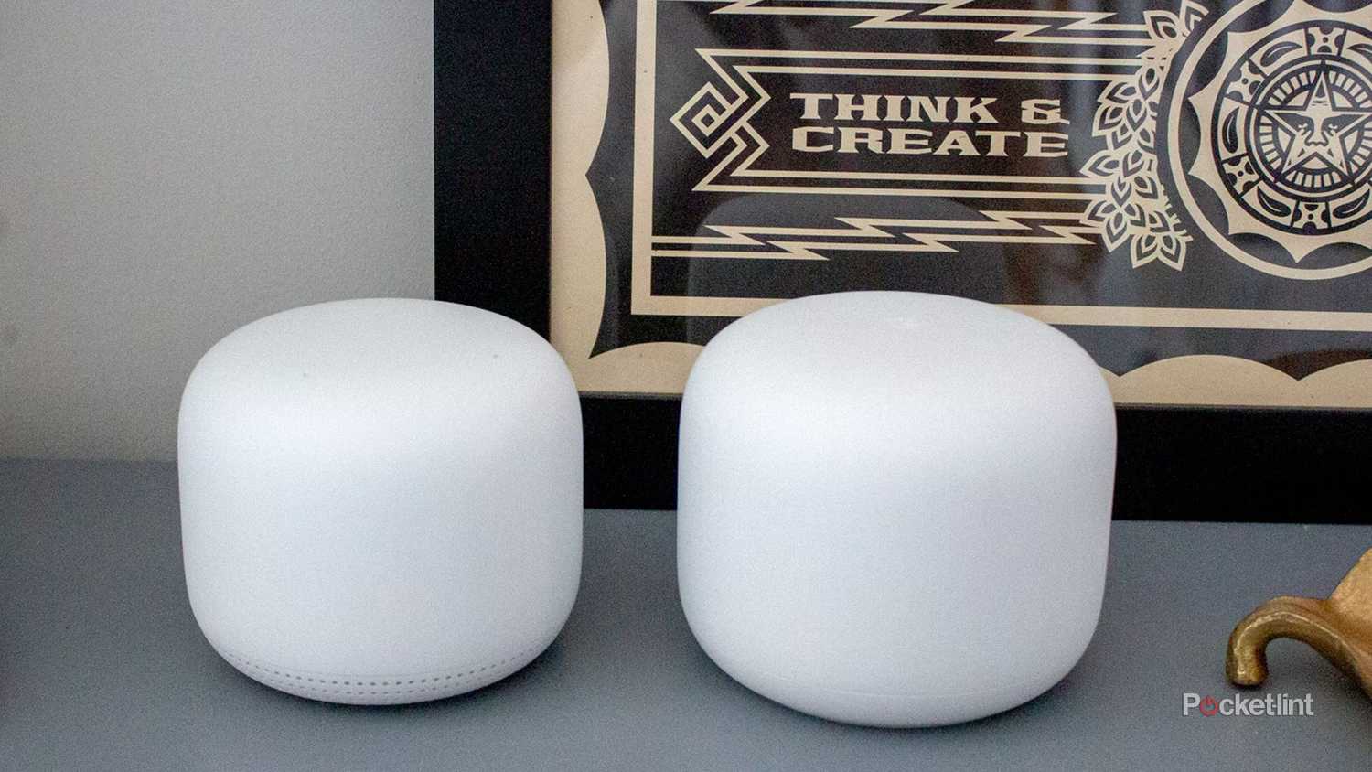 A pair of Google Nest Wifi units.