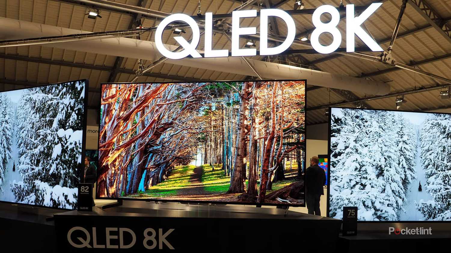 Samsung 8K QLED TVs on display.