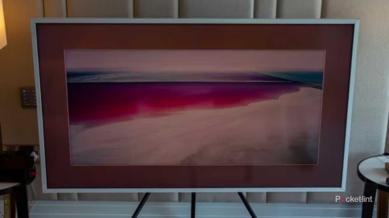 Samsung's The Frame TV in a dim room.