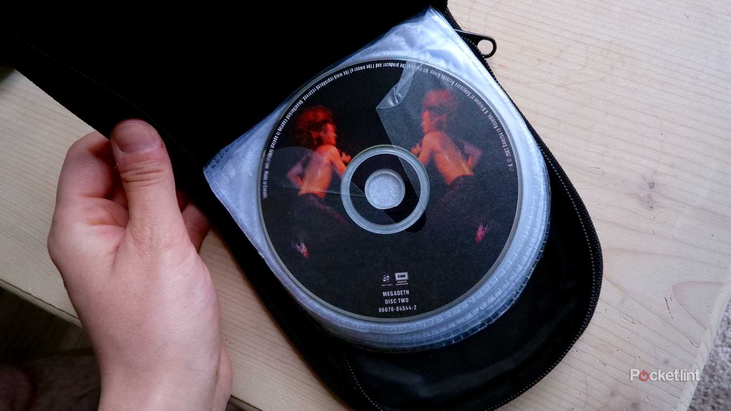 A Megadeth CD in a travel case