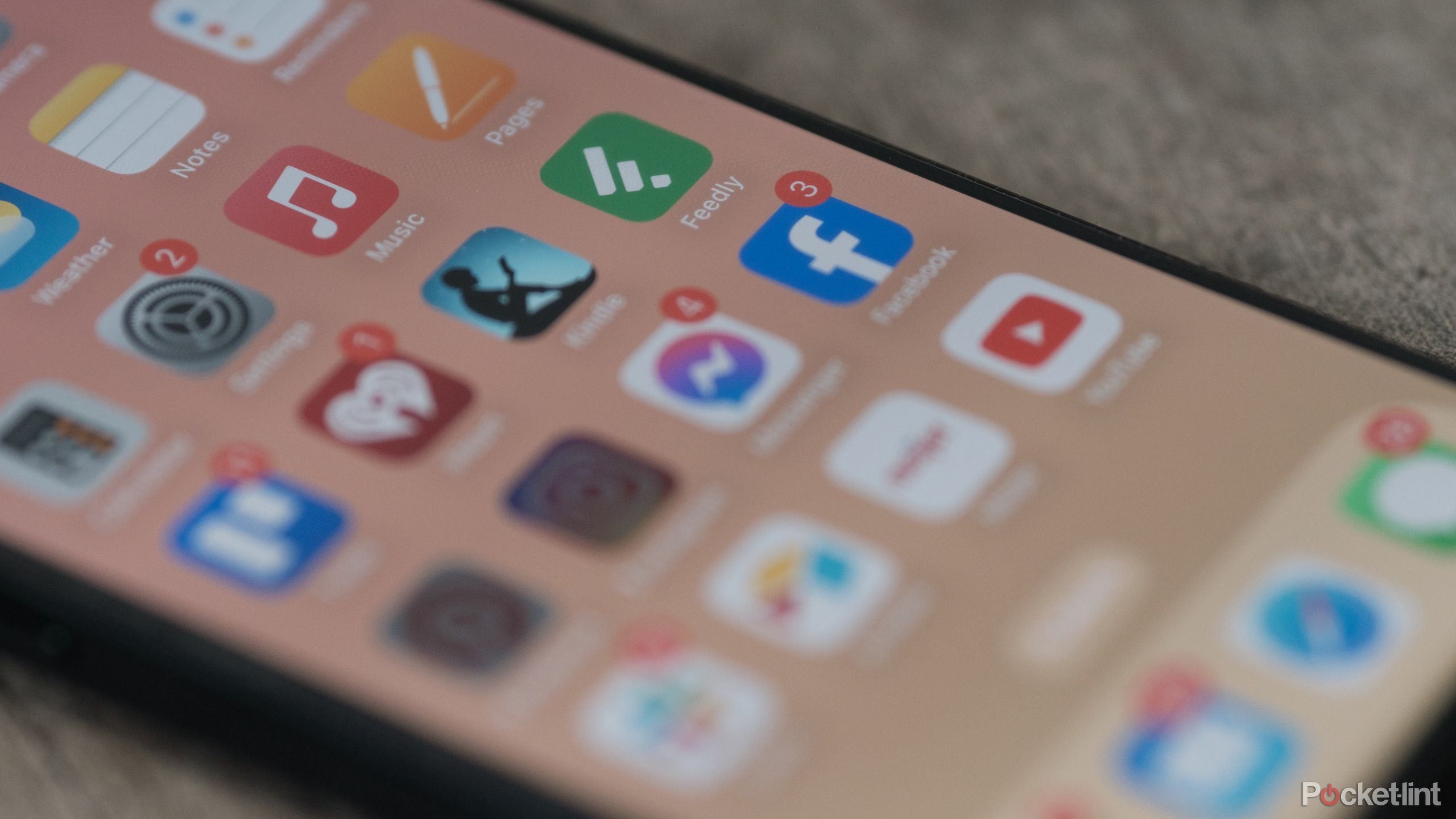 The Facebook icon on an iPhone homescreen.