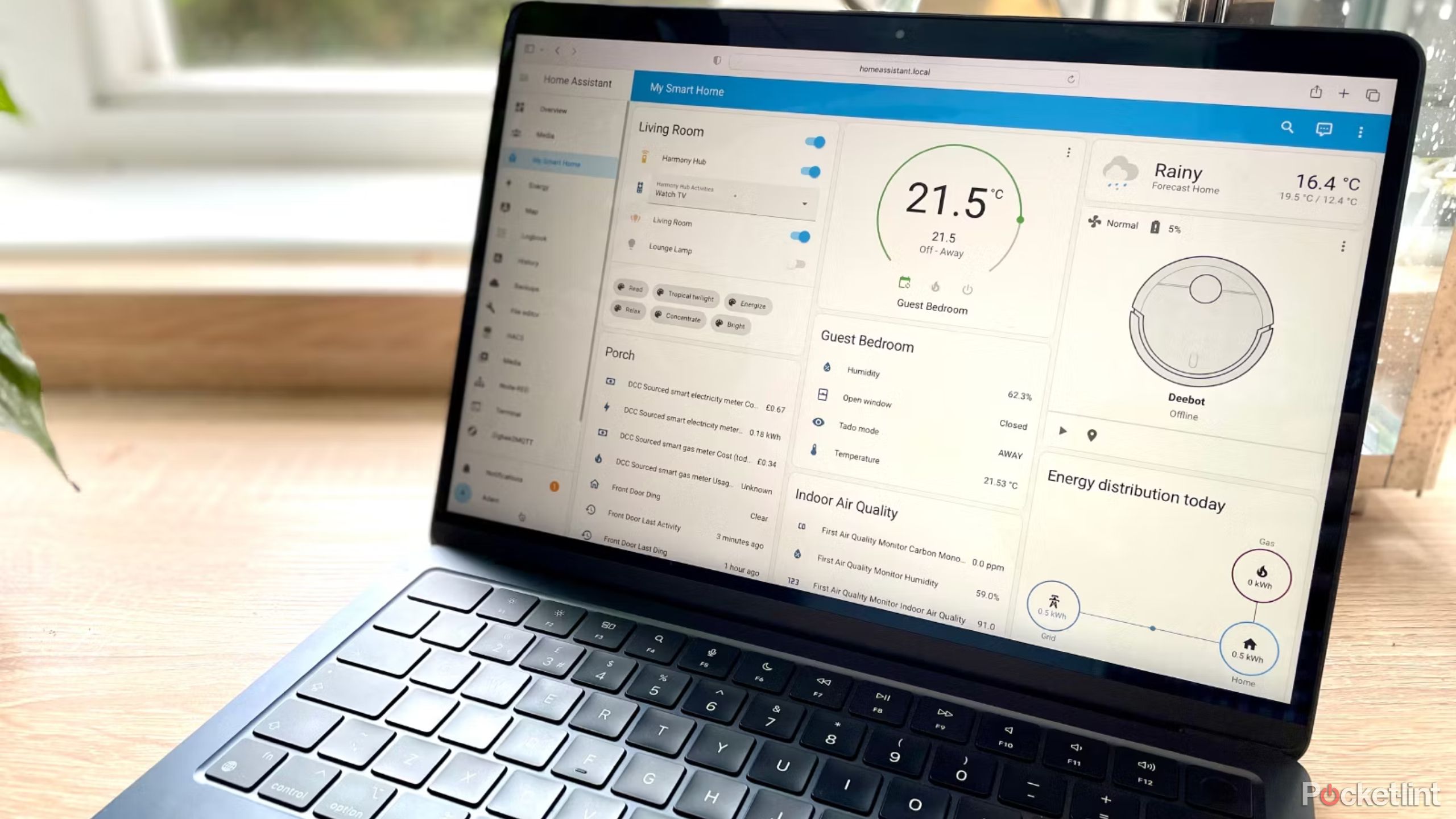 Home Assistant dashboard displayed on a MacBook Air.