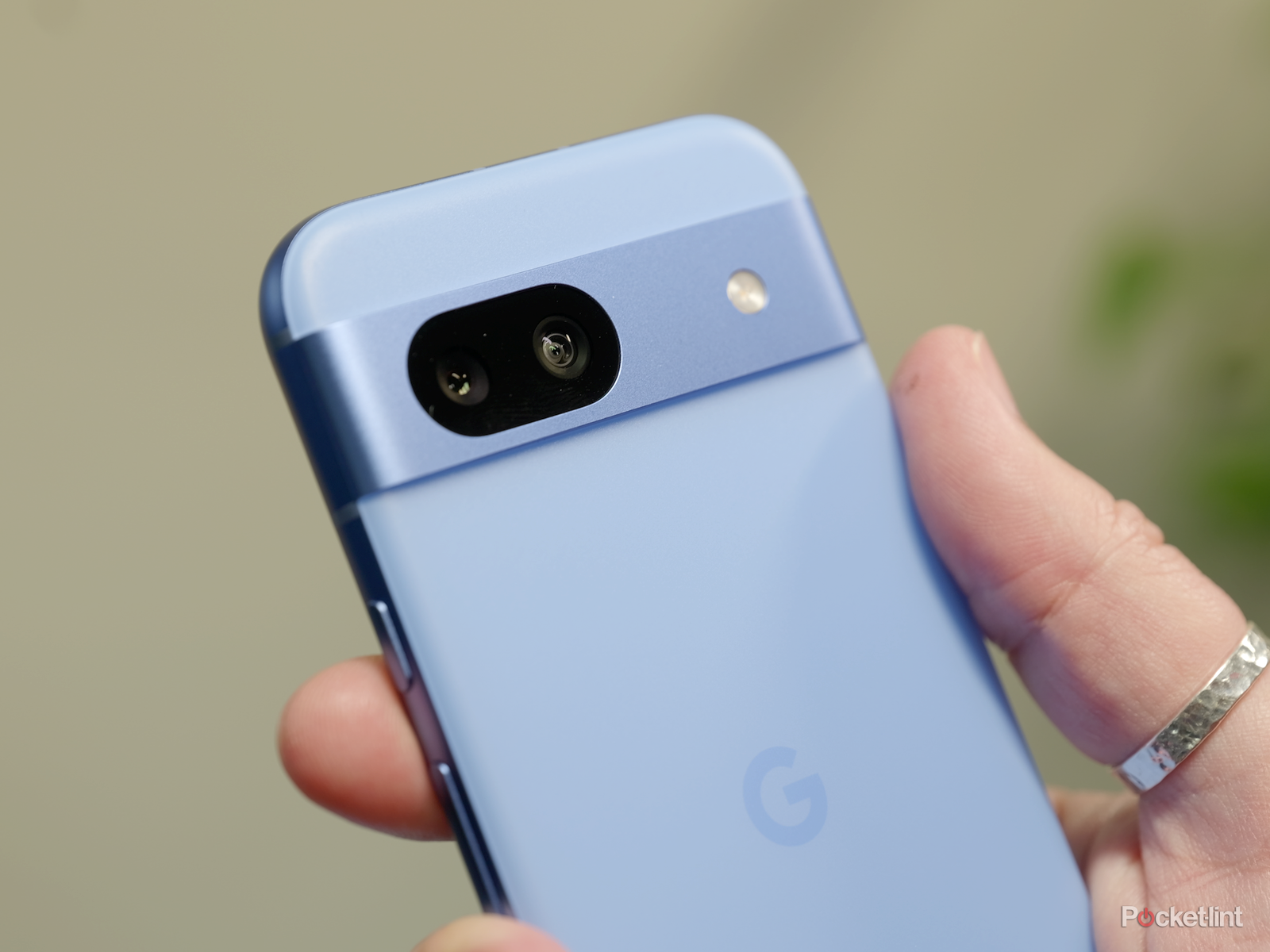 pixel-8a-cameras-in-hand-close