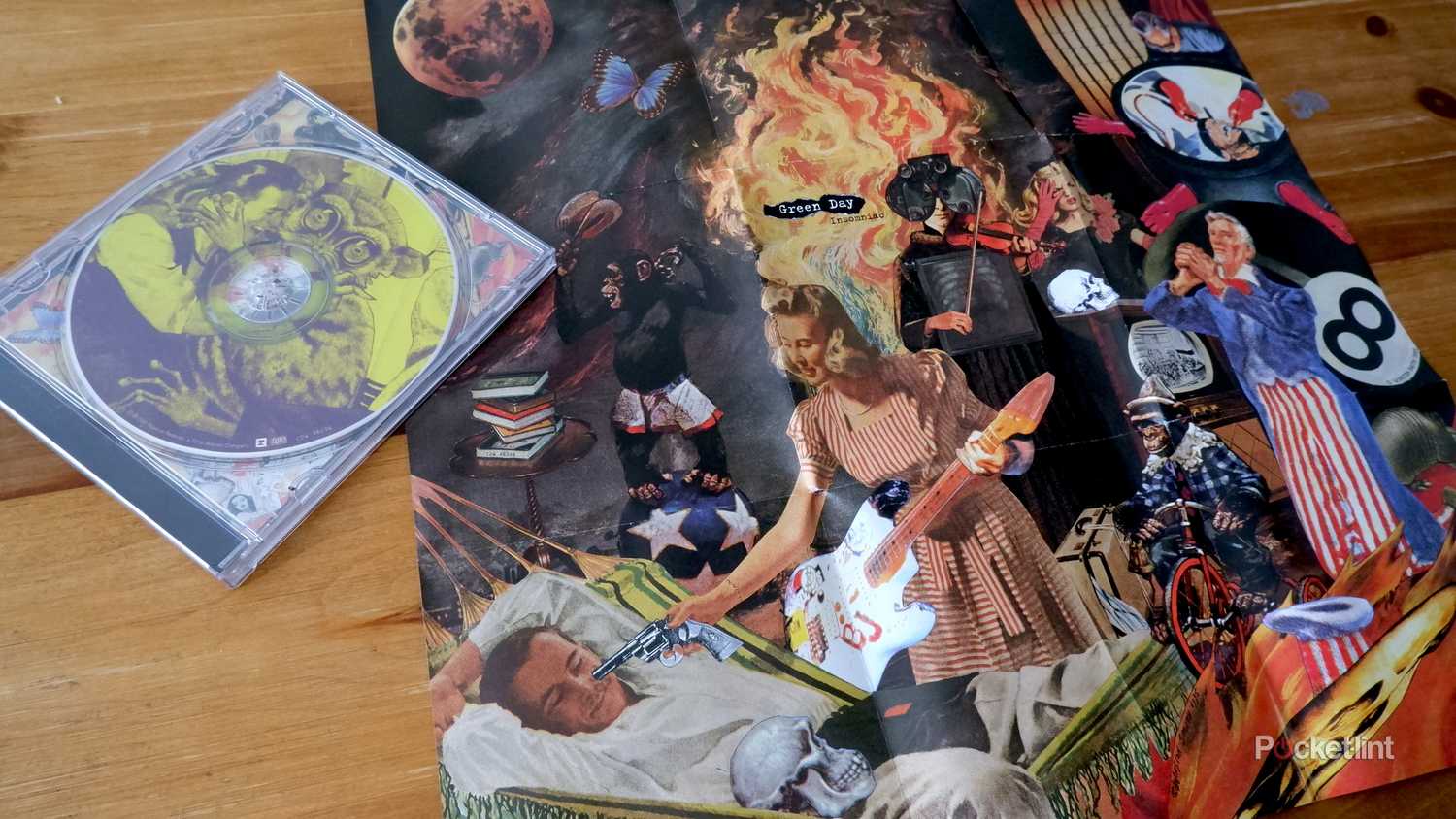 The album insert for Green Day's 1995 record Insomniac, which expands into a full poster.