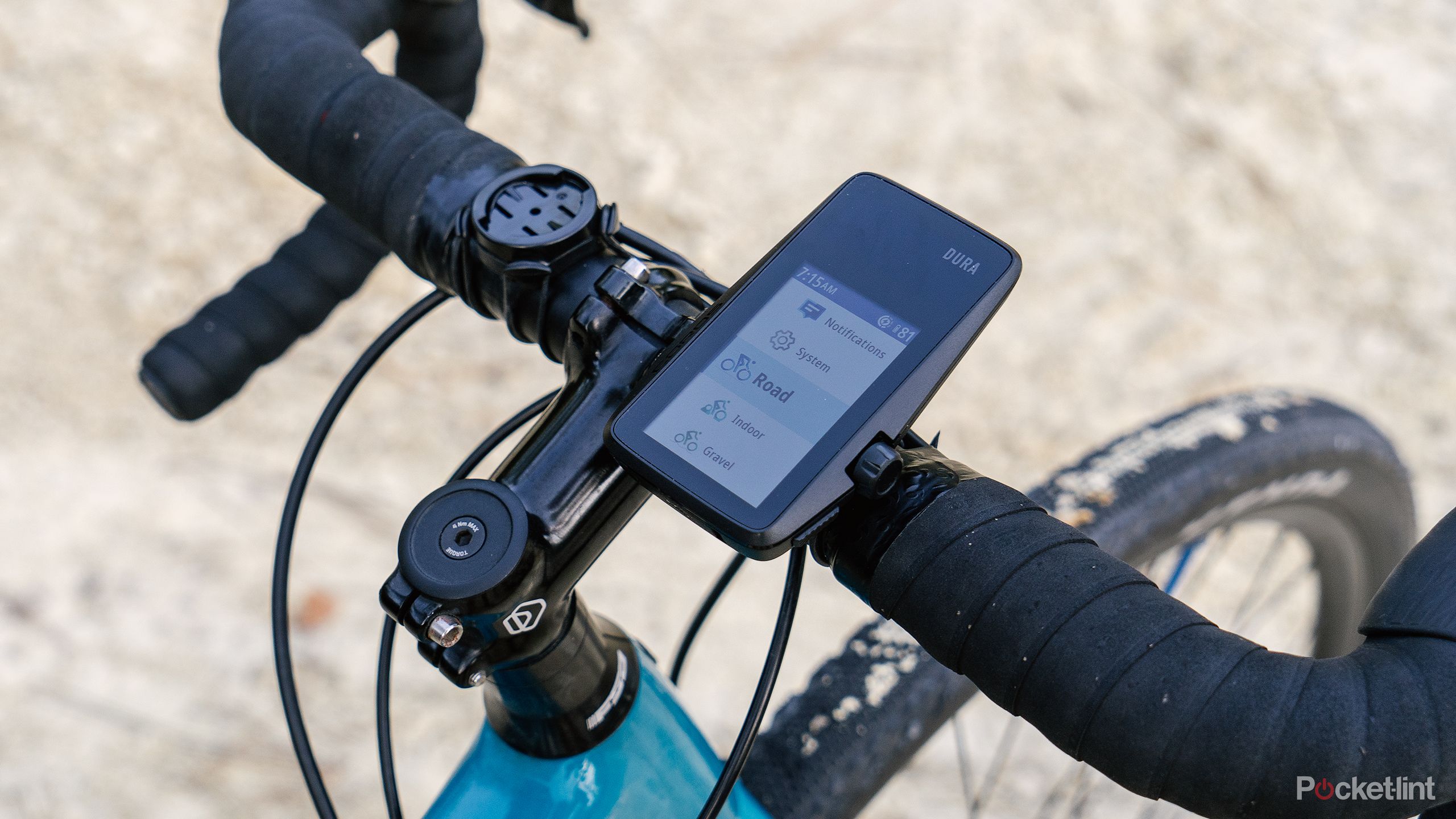 The Coros Dura mounted to a bike. 