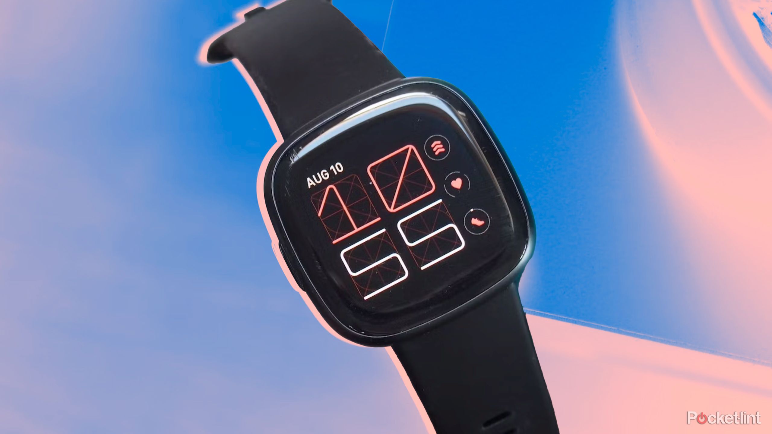 The Fitbit Versa 4 against a blue and pink background. 