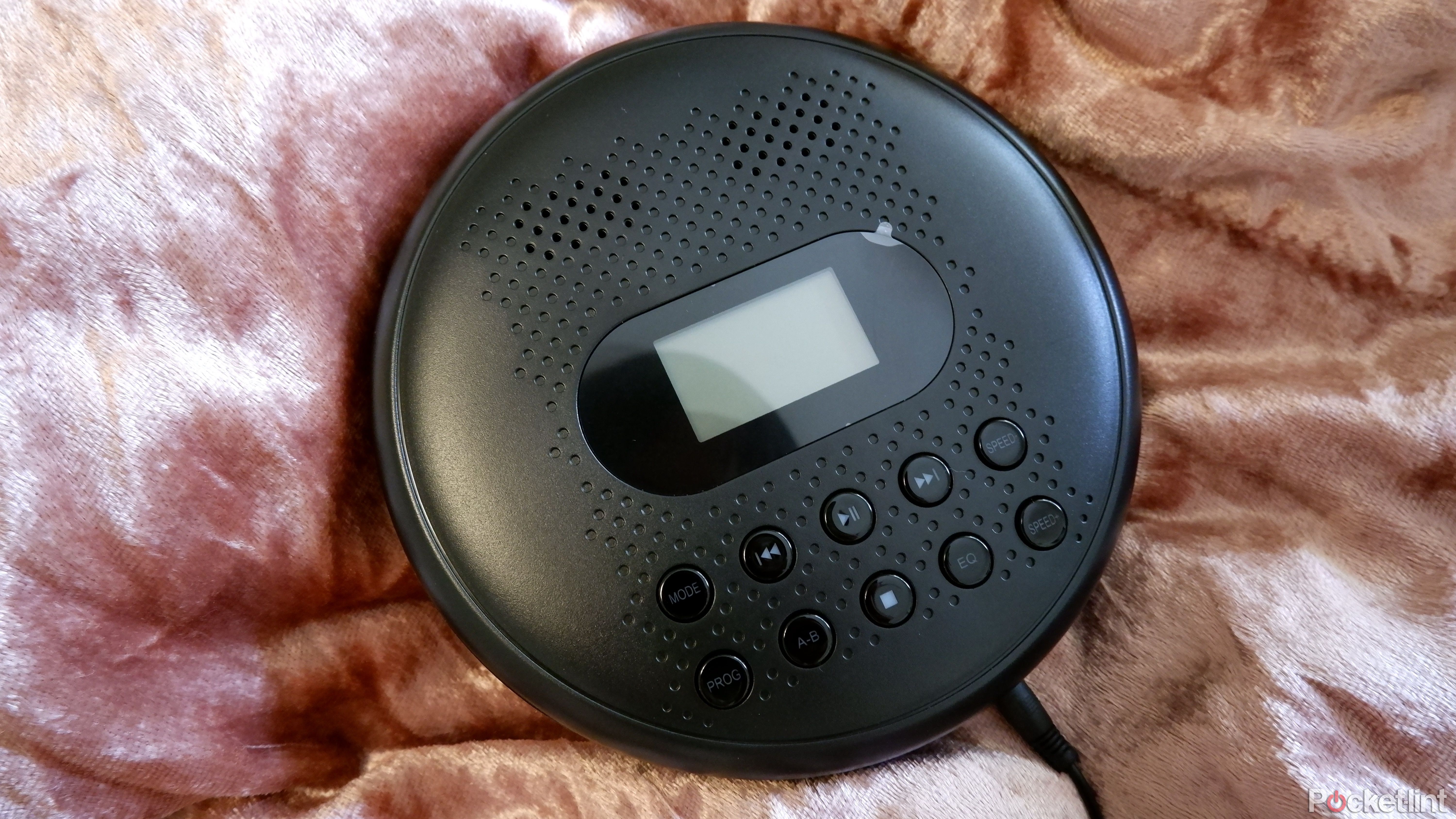 The ARAFUNA CD player on a pink velvet blanket